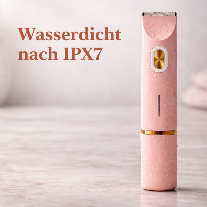 Rózsaszín trimmer vízcseppekkel borítva márvány felületen, a vízállóságot hangsúlyozó felirattal. 11