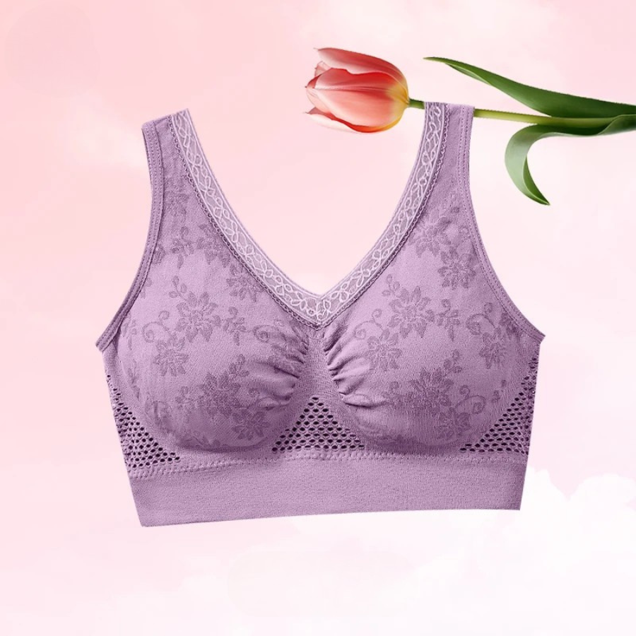 Lila melltartó rózsaszín háttér előtt, fölötte tulipán virág, elölnézetből 6