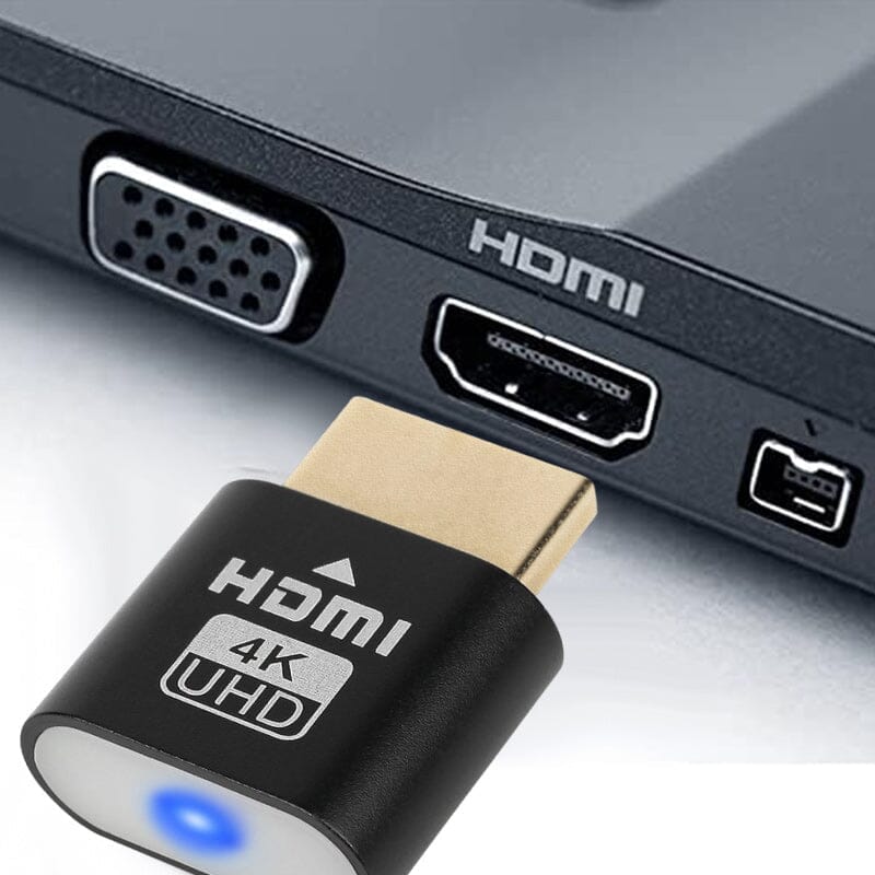 Közeli kép: a fekete HDMI-dugó egy laptop HDMI-portja elé tartva, mellette VGA és más csatlakozók láthatók. 3