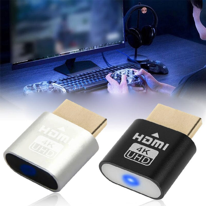 Ezüst és fekete HDMI-eszköz egymás mellett, a háttérben játékos gamepaddal a kezében asztali gép előtt ül. 10