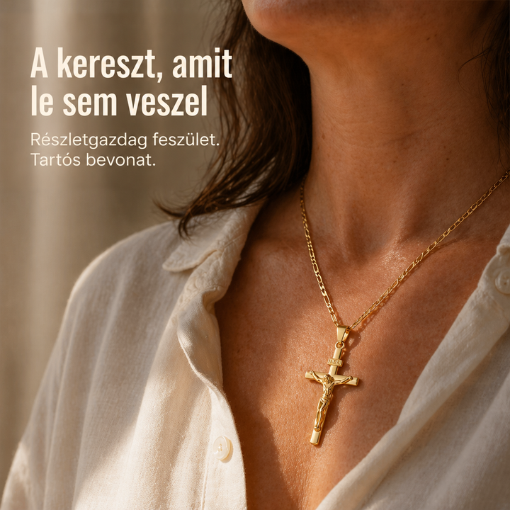 Közeli kép egy nő nyakáról, aki fehér ingblúzt és aranyszínű feszületes nyakláncot visel 1